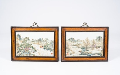 Two framed Chinese famille rose 'animated river landscape' plaques, 20th C.