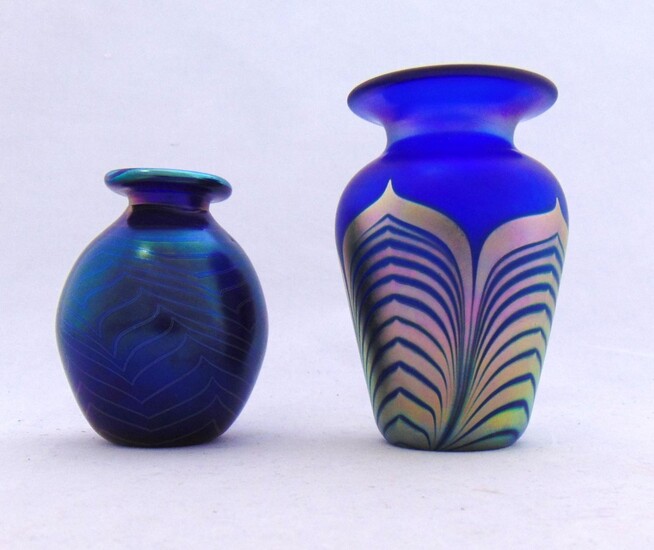 Two iridescent blue glass vases