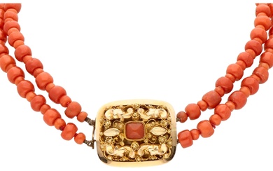 Two-row antique red coral necklace with 14K yellow gold regional costume clasp.