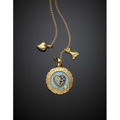 UNOAERRE Yellow gold chain with Telegatto central, a rattle pendant and a diamond and sapphire zodiacal pendant of cm 4.40…Read more