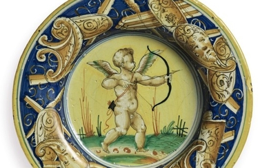 VENICE OR CASTEL DURANTE, DATED 1553 | A DISH DECORATED A TROFEI
