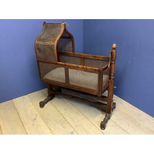 Victorian mahogany framed bergère crib swinging on a stand. ...