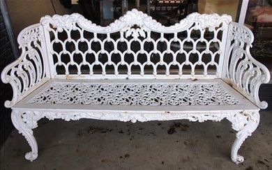 White cast iron garden bench with pierced back and seats