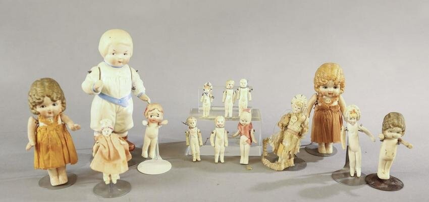 12 All bisque dolls with jointed arms.