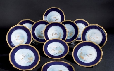 12 Limoges blue, gilt and polychrome porcelain plates