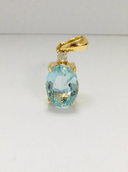 14ct Yellow Gold Aquamarine and Diamond pendant featuring,...