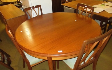20th Century G Plan circular extending dining table on taper...