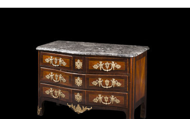 A late 18th-century French bois de rose and bois de violette veneered commode. Gilt-bronze mounts and marble top (cm 128x86x61)...
