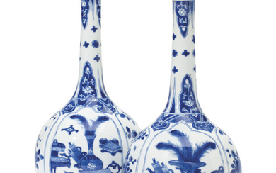 A MATCHED PAIR OF CHINESE BLUE AND WHITE BOTTLE VASES, KANGXI PERIOD (1662-1722)