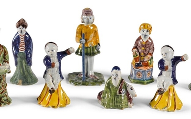 A group of eight Dutch Delft polychrome figures, 18th century