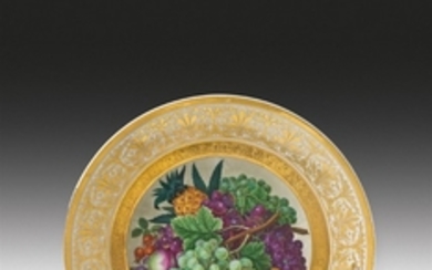 A Berlin KPM porcelain plate with a fruit sti ...