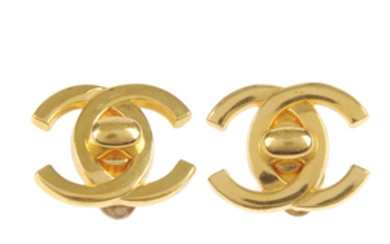 CHANEL - a pair of CC Turnlock ear clips.