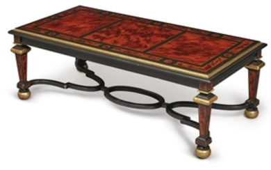 An Italian Baroque style parcel gilt simulated tortoiseshell and ebony low table
