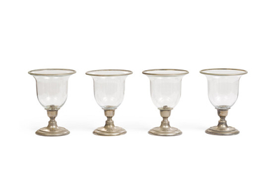 A set of four glass and silver plated hurricane lamps
