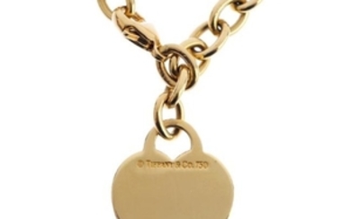 TIFFANY & CO. - an 18ct gold bracelet. The trace-link