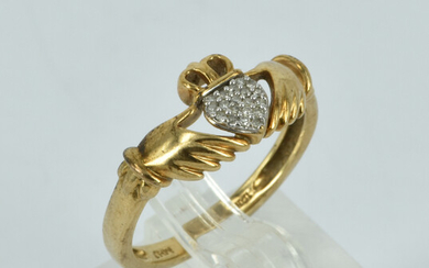 A 10CT GOLD AND DIAMOND CLADDAGH RING