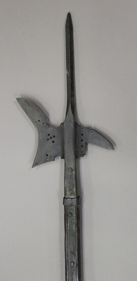 A 16th century style North German halberd with central spike, crescentic axe-blade and downturned re