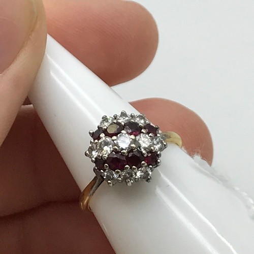 A Beautiful example of a ladies Diamond and Ruby cluster rin...