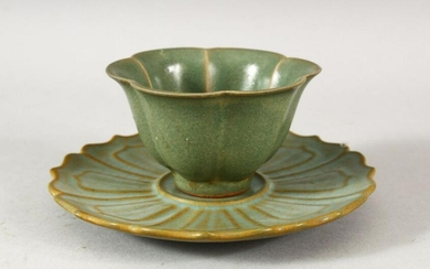 A CHINESE CELADON TEA CUP AND SAUCER, the cup 8.5cm