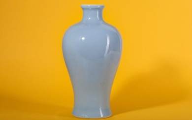 A CHINESE CLAIR-DE-LUNE VASE, MEIPING. Qing Dynasty, 18th Century. The tapered body rising to a rounded shoulder and a short flared neck, the interior and underside white, 30.5cm H. Provenance: Christie's [label]. 清十八世紀 天藍釉梅瓶 來源：佳士得（標籤）。
