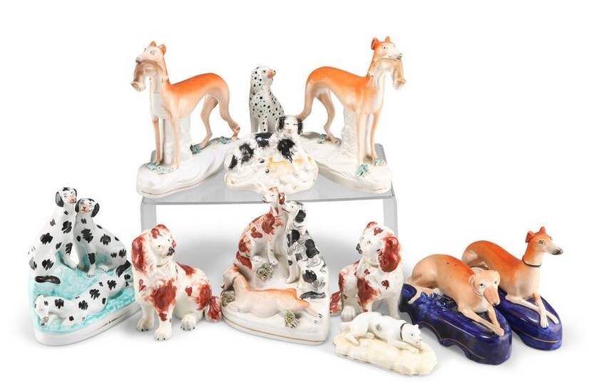 A COLLECTION OF STAFFORDSHIRE POTTERY DOG MODELS, 19TH