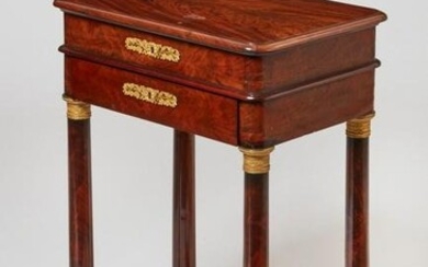 A Charles X mahogany work/writing table