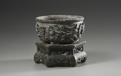 A Chinese carved stone jardinière and stand