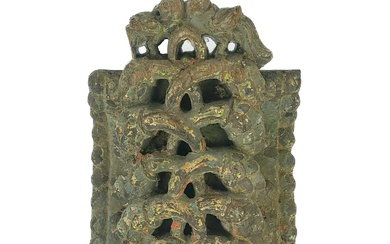 A Chinese carved wood roof tile, 19th century.
