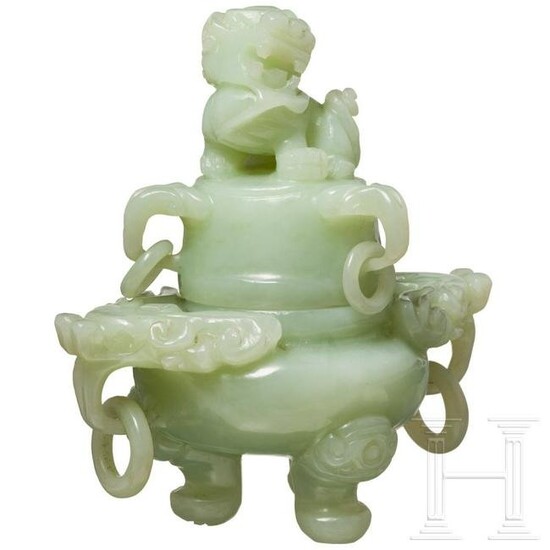 A Chinese lidded vessel in light green jade, late