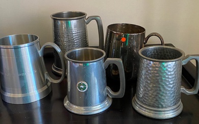 A Collection of Silver Plate Tankards