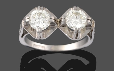 A Diamond Two Stone Ring, the round brilliant cut diamonds...