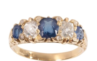 A FIVE STONE SAPPHIRE AND DIAMOND RING three graduated oval-...