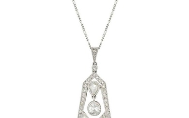 A FRENCH DIAMOND PENDANT NECKLACE in platinum, the openwork pendant set with two pear shaped rose...