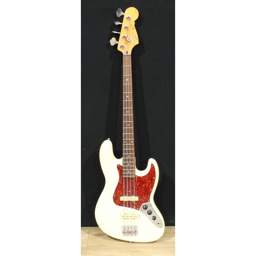 A Fender Squier Jazz Bass guitar, made in Korea, numbered S1...