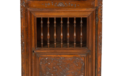 A French Provincial Carved Walnut Panettière