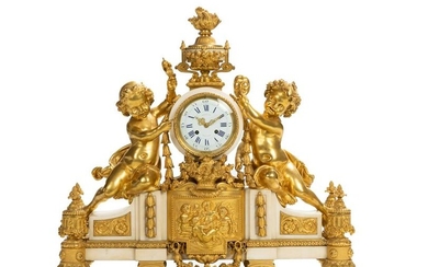 A French gilt-bronze and marble mantel clock retailed