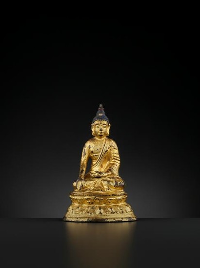 A GILT BRONZE OF BUDDHA SHAKYAMUNI, LATE MING