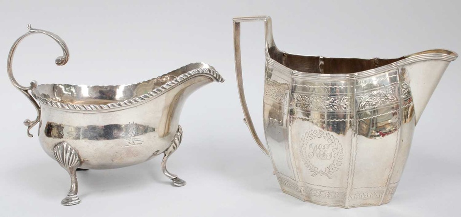 A George III Silver Sauceboat, London, 1776, oval and on...