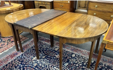 A George III mahogany D end extending dining table, 264cm ex...