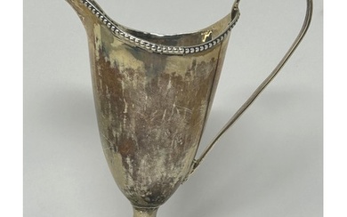 A George III silver cream jug, London 1782