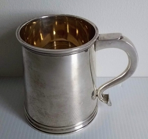A George VI one pint silver tankard of pain tapered form by ...