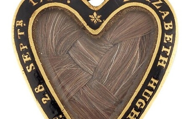 A Georgian mourning locket, of heart form, the glazed front...