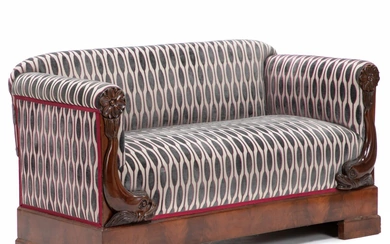 A Germasn late Empire mahogany sofa. Ca. 1830. L. 152 cm.