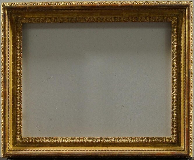A Gilded Composition Carlo Maratta Style Frame, late 20th century, with leaf ogee sight, ribbon course, plain top knull and egg-and-dart back edge, 34.8 x 45 cm (sight): An English Gilded Composition Salvator Rosa Style Frame, 20th century, with...