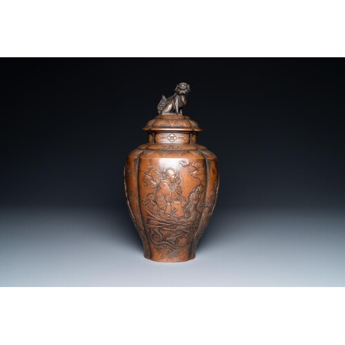 A Japanese hammered brass vase and cover, Meiji, 19th C.Desc...