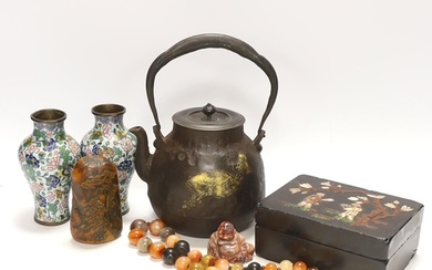A Japanese iron tetsubin kettle with gilt decoration, a pair...