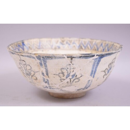 A LARGE PERSIAN TIMURID POTTERY BOWL, decorated with various...