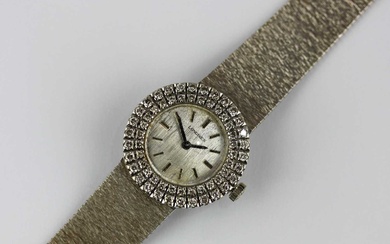 A Longines 18ct white gold and diamond lady's dress bracelet watch