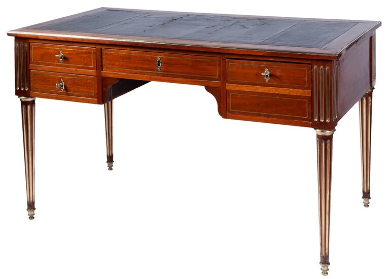 A Louis XVI style mahogany brass mounted rectangular desk,...