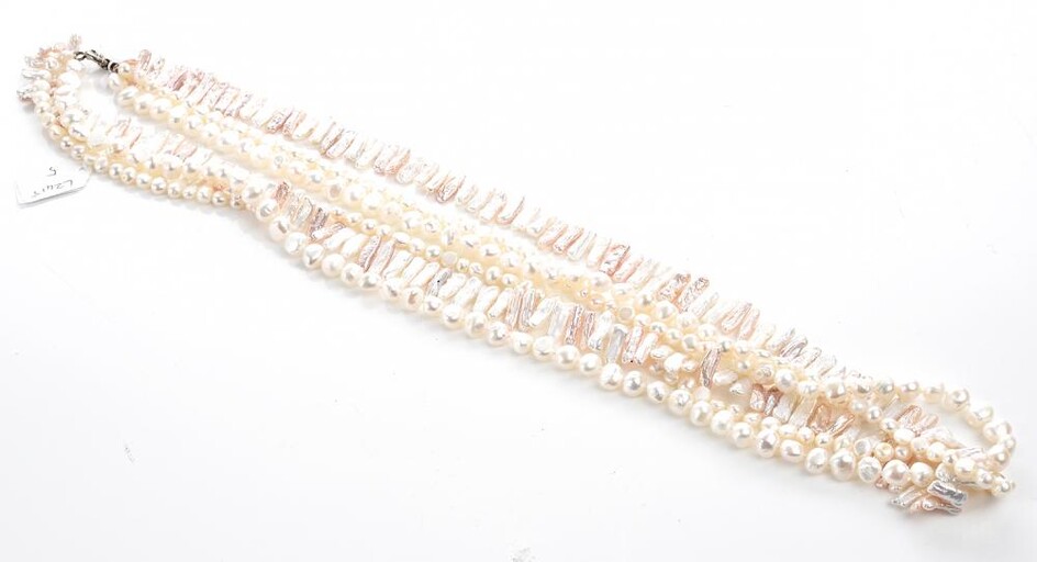 A MULTI STRAND FRESHWATER PEARL NECKLACE IN PINK AND WHITE TONES